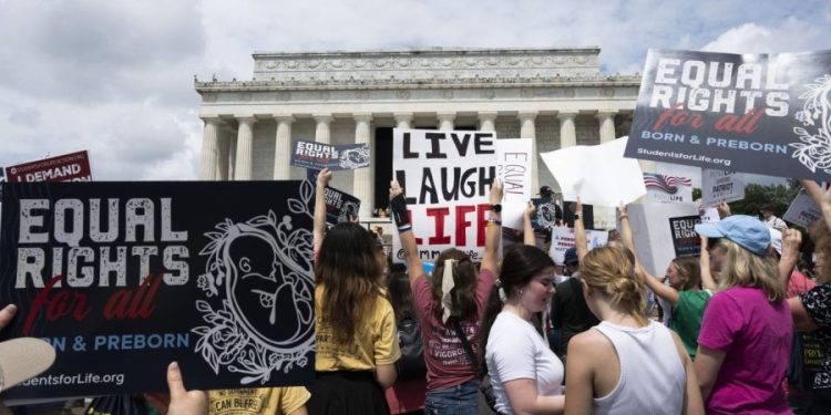 One year later, the Supreme Court’s abortion decision is both scorned and praised
