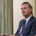 Newsom signs bill raising minimum wage for California health care workers to $25