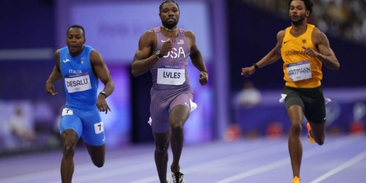 Olympics shrugs off COVID outbreak: Noah Lyles among 40 athletes testing positive